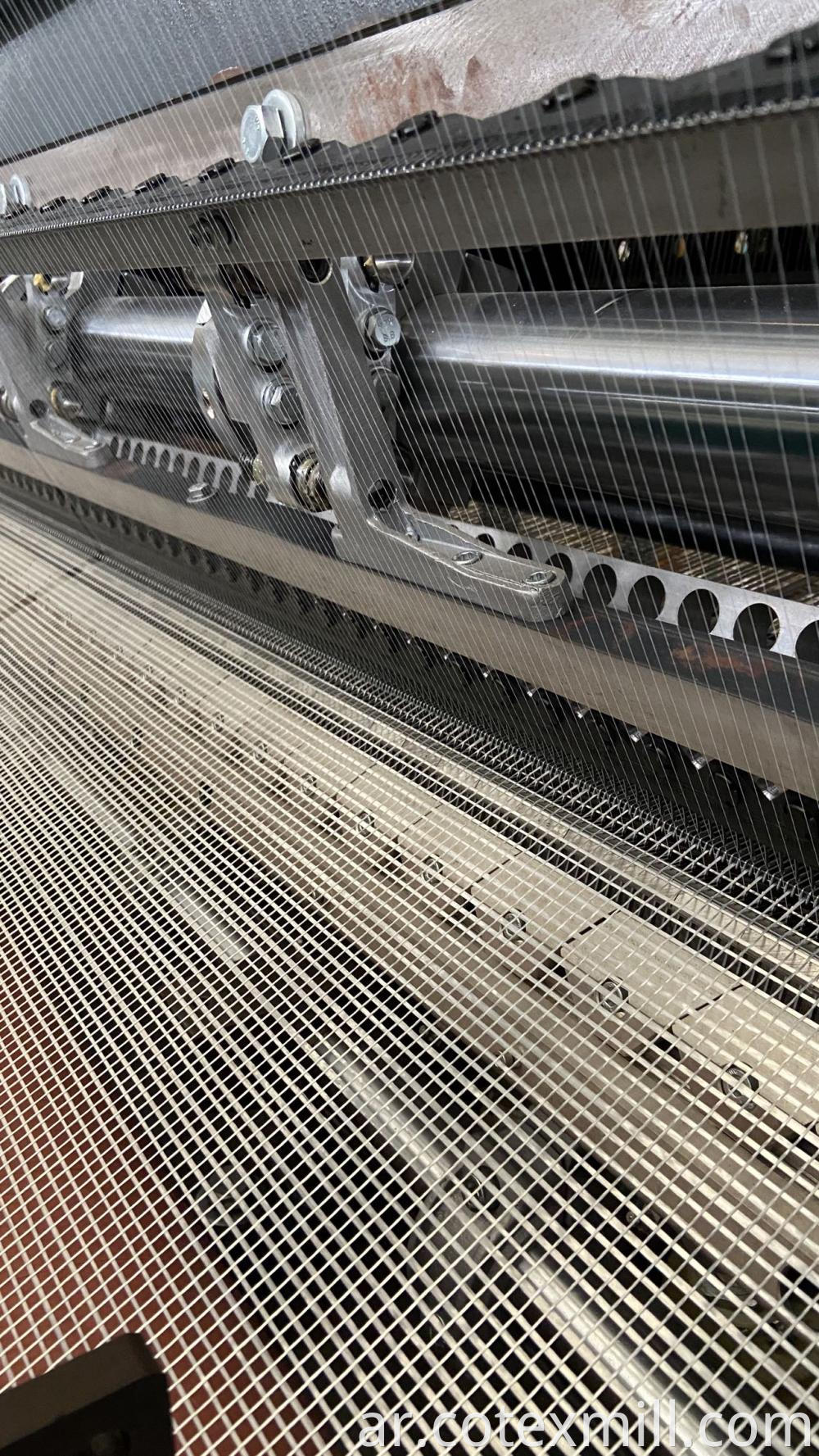 weft insertion warp knitting machine